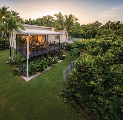 Raised house in garden setting