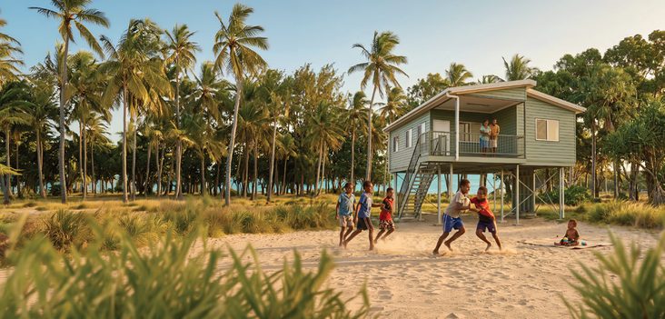 Raised home among coconut palms